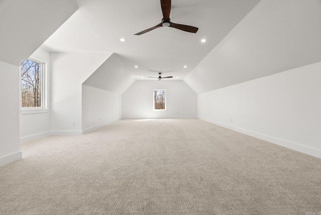 bonus room featuring a ceiling fan, recessed lighting, carpet floors, baseboards, and vaulted ceiling