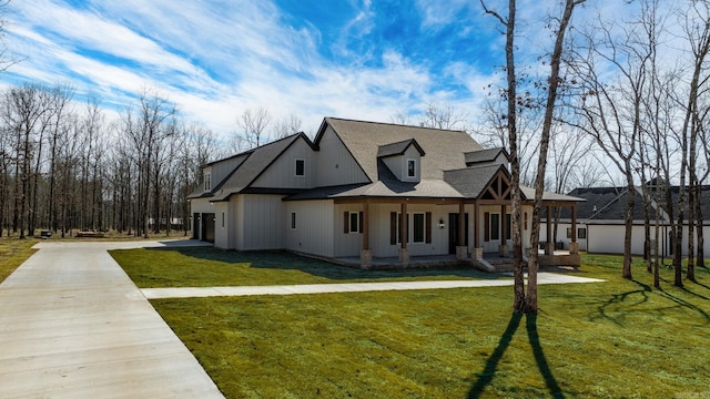 view of home's exterior featuring a yard and a porch