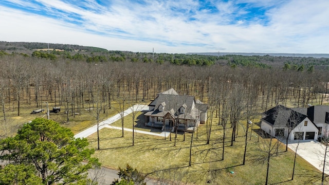 drone / aerial view with a rural view and a forest view