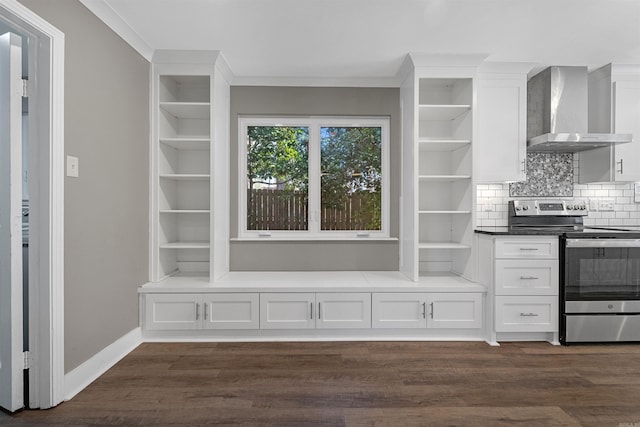 kitchen featuring open shelves, stainless steel electric stove, dark wood-style floors, white cabinetry, and wall chimney range hood