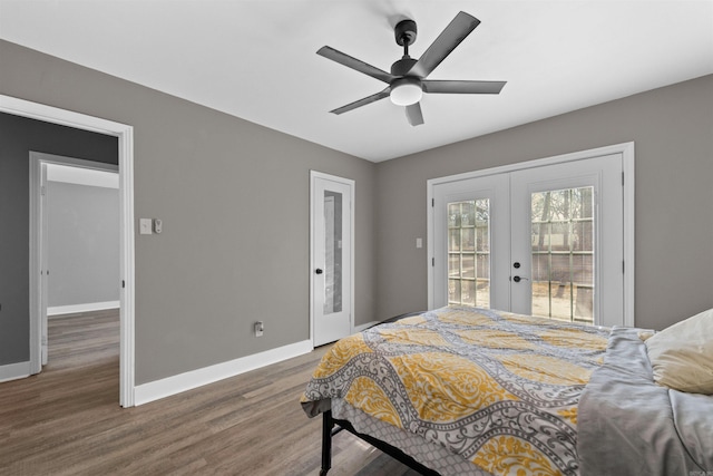 bedroom with access to outside, french doors, baseboards, and wood finished floors