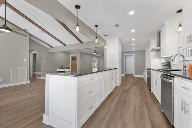 kitchen featuring dishwasher, lofted ceiling with beams, visible vents, and a sink