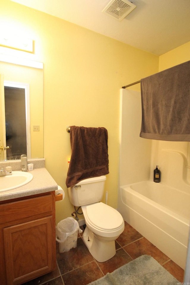 full bathroom featuring vanity, visible vents, shower / tub combination, tile patterned floors, and toilet