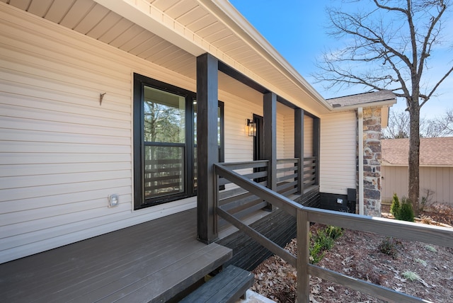 wooden terrace featuring a porch