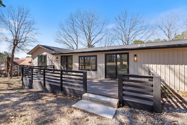 doorway to property with a deck