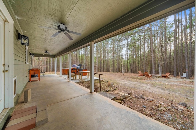 view of patio featuring ceiling fan