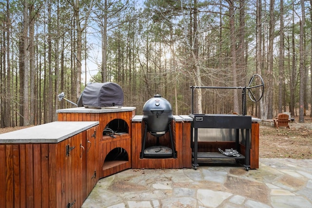 view of patio / terrace featuring a jacuzzi