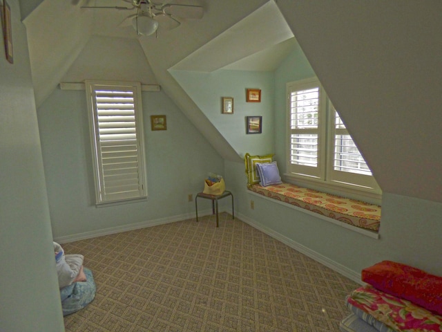 additional living space featuring ceiling fan, baseboards, lofted ceiling, and carpet