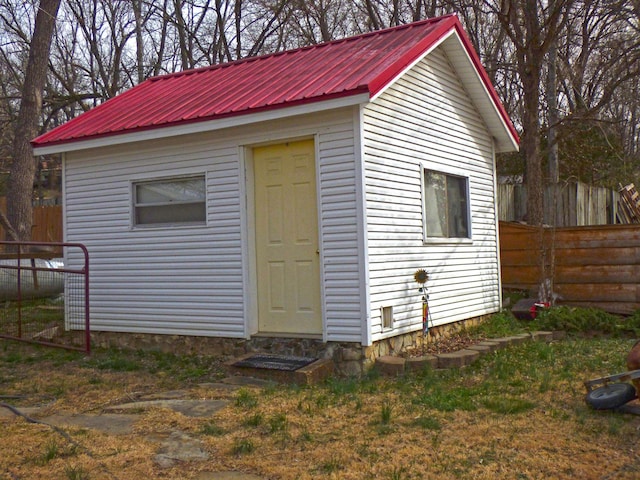 view of outdoor structure with an outdoor structure and fence