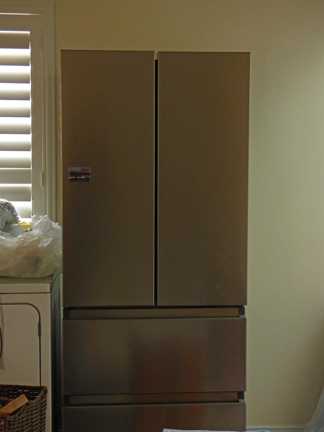 details featuring freestanding refrigerator