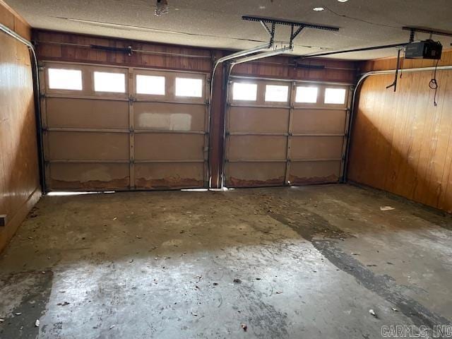 garage featuring a garage door opener