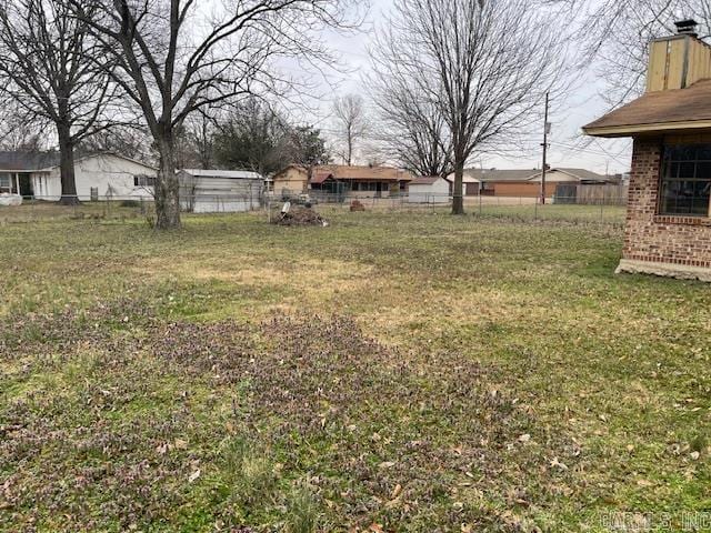 view of yard featuring fence