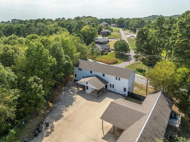 aerial view featuring a view of trees