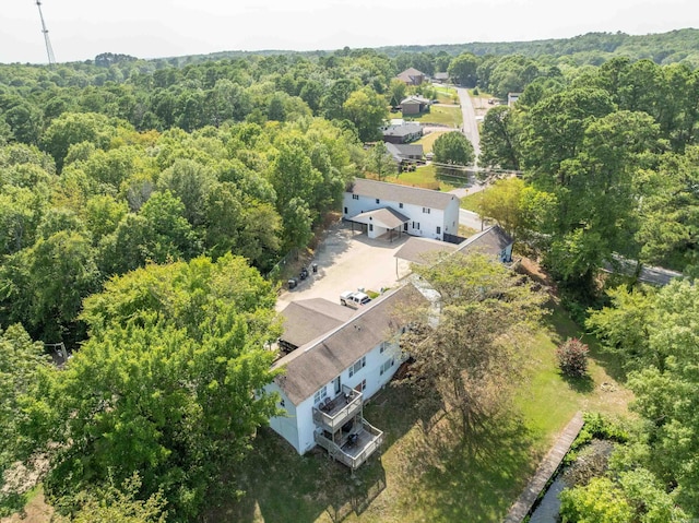 bird's eye view featuring a view of trees