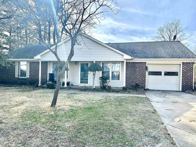 ranch-style house with driveway, a shingled roof, a front lawn, a garage, and brick siding