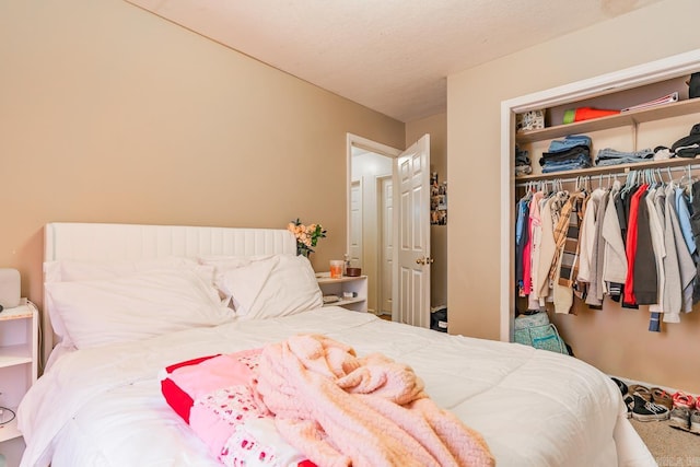 carpeted bedroom with a closet