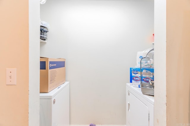 laundry room with laundry area and washer and dryer