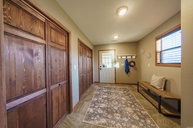 interior space with baseboards