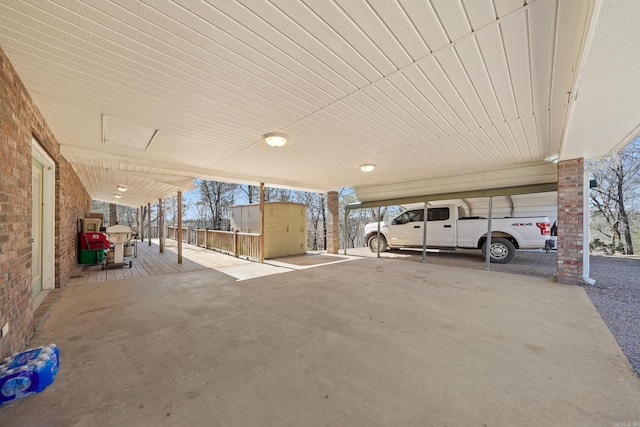 exterior space featuring a carport and a shed