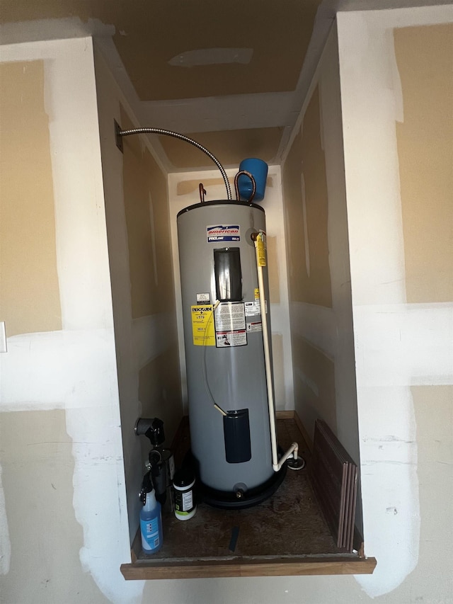 utility room with water heater