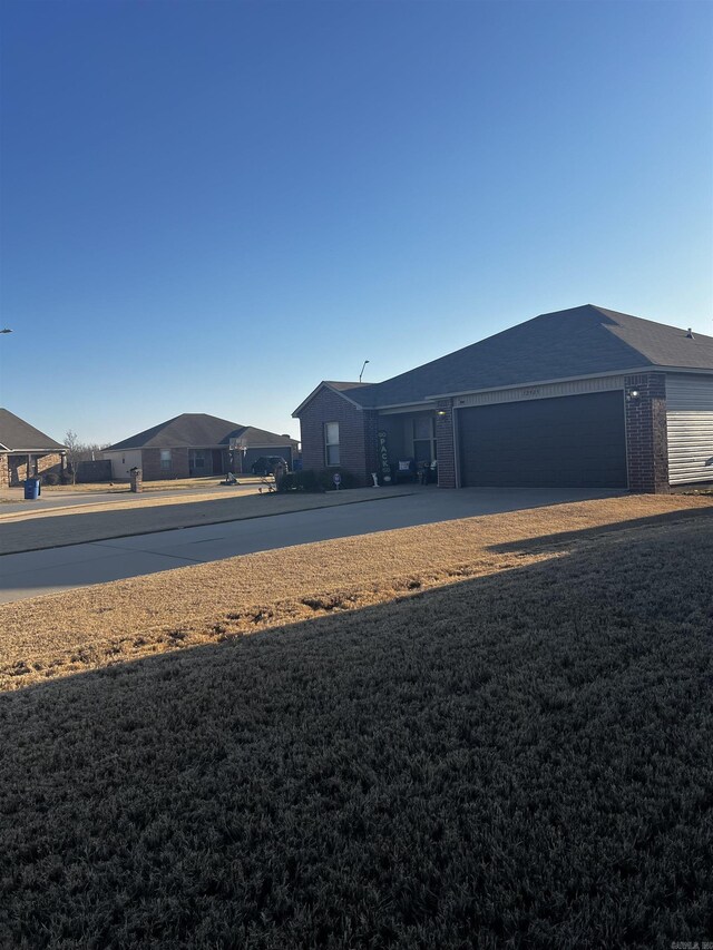 view of yard featuring a garage