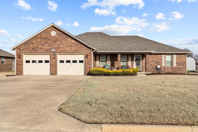 single story home with brick siding, an attached garage, driveway, and a shingled roof