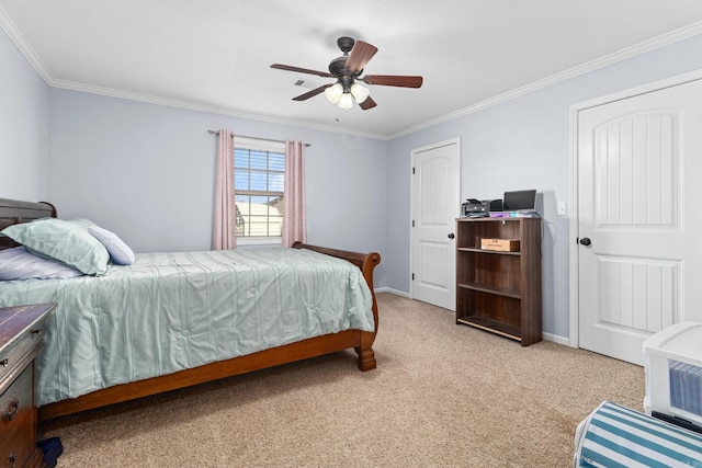 bedroom featuring ornamental molding, visible vents, baseboards, and light carpet