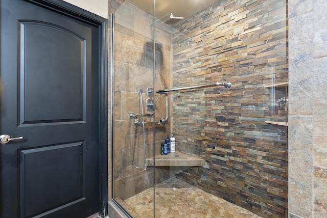 full bathroom with a shower stall