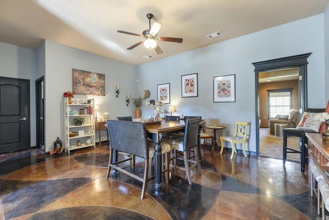 dining area featuring a ceiling fan, visible vents, and baseboards