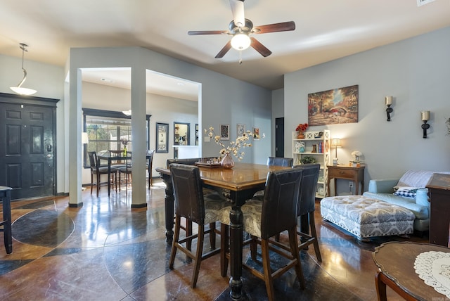 dining area with a ceiling fan, visible vents, and baseboards