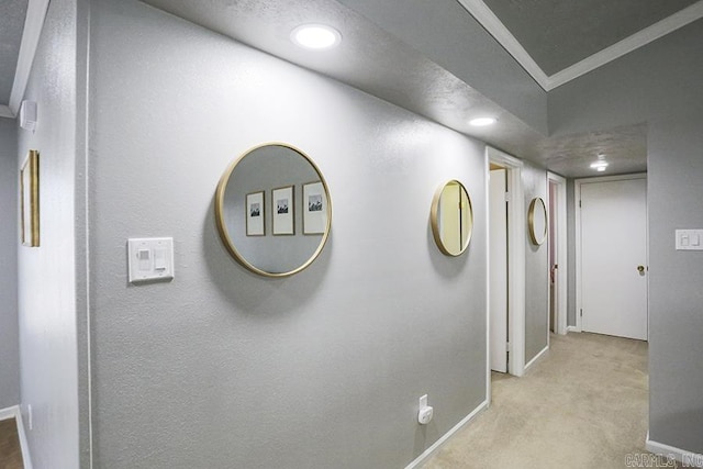 hall with recessed lighting, baseboards, and light carpet