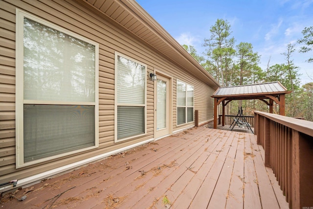 wooden deck with a gazebo