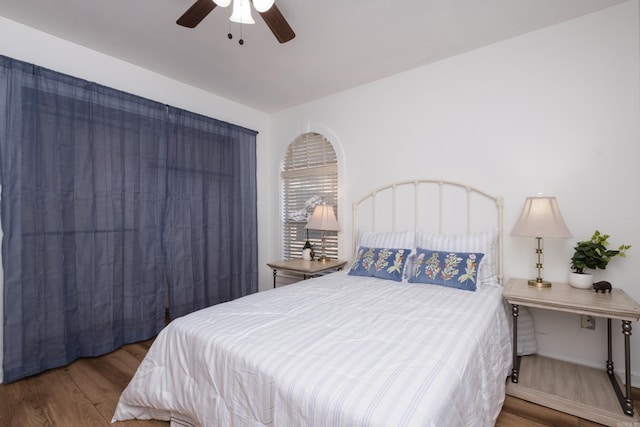 bedroom featuring ceiling fan and wood finished floors