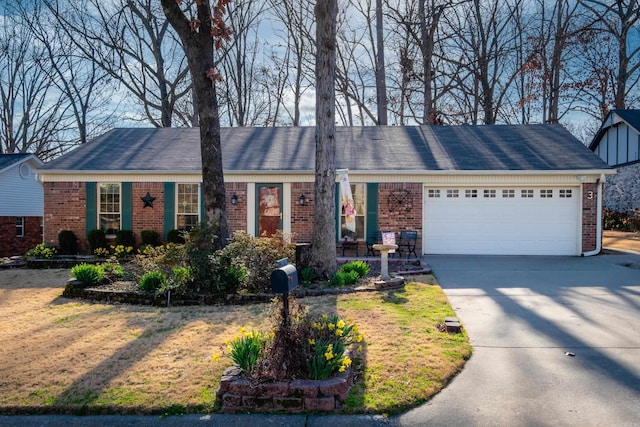 ranch-style home featuring a garage, brick siding, and concrete driveway