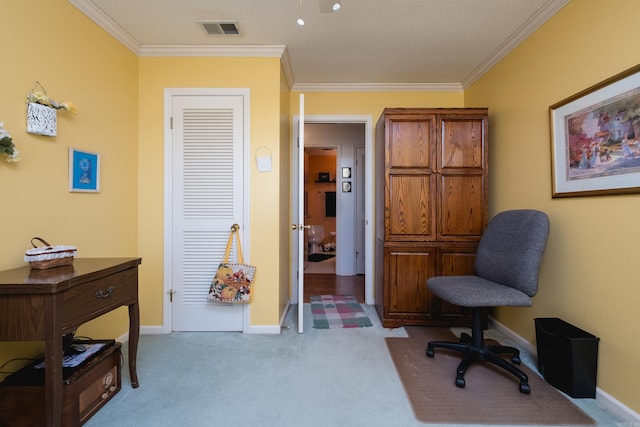 office with crown molding, baseboards, visible vents, and carpet floors