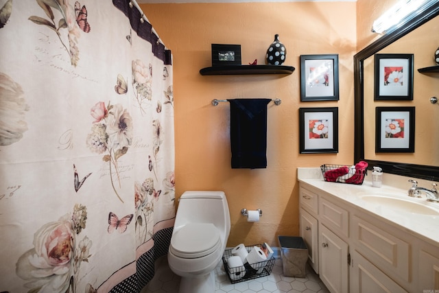 full bath with vanity, toilet, a shower with curtain, and tile patterned flooring