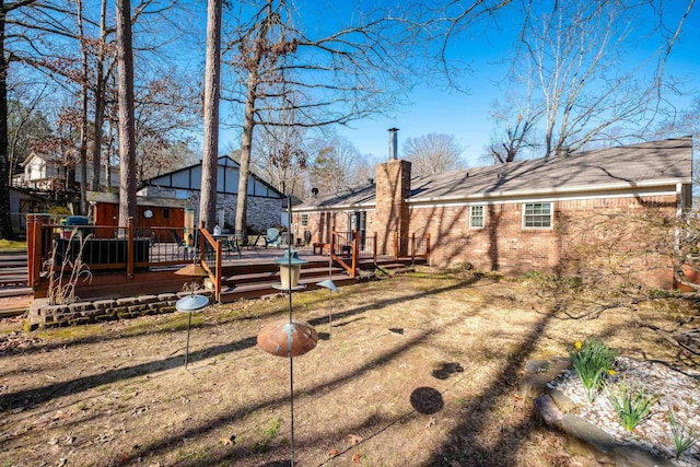 view of yard with a deck