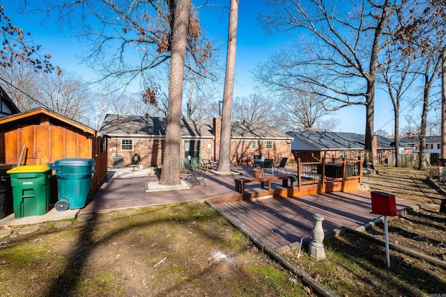 view of yard with a wooden deck