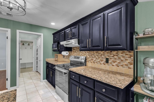 kitchen with black microwave, under cabinet range hood, light tile patterned floors, decorative backsplash, and stainless steel range with electric cooktop