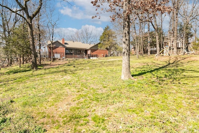 view of yard with a playground