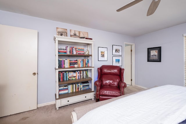 bedroom featuring baseboards, carpet floors, and ceiling fan