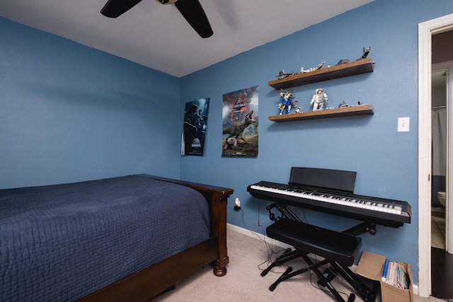 carpeted bedroom with baseboards and ceiling fan