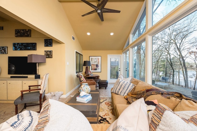 living room featuring visible vents, baseboards, recessed lighting, high vaulted ceiling, and a ceiling fan