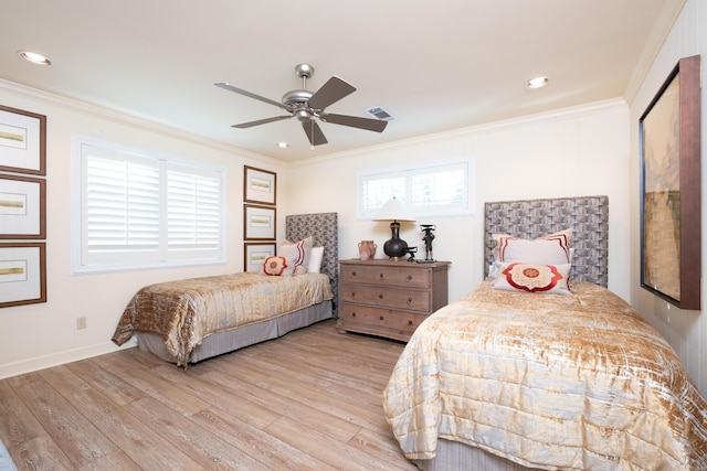 bedroom with recessed lighting, visible vents, light wood-style flooring, and crown molding