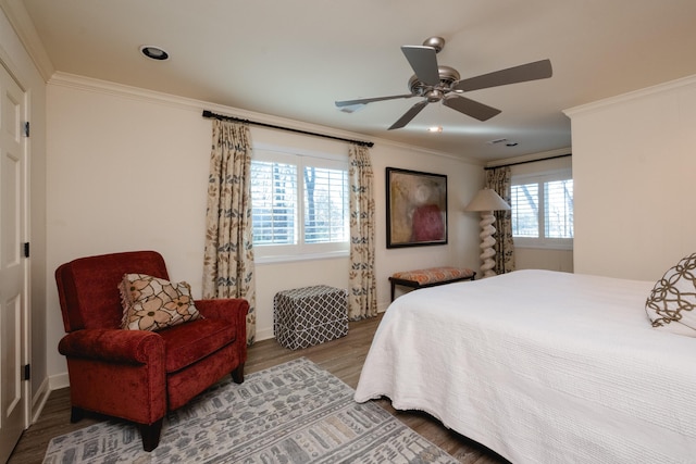 bedroom featuring recessed lighting, wood finished floors, ceiling fan, and ornamental molding