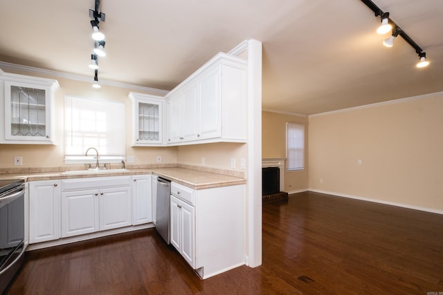 kitchen with ornamental molding, electric stove, a sink, dark wood finished floors, and white cabinets