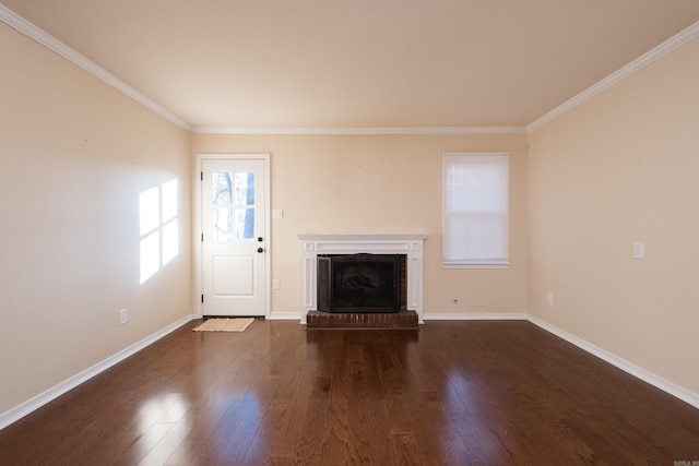 unfurnished living room featuring baseboards, dark wood-style floors, a fireplace, and crown molding