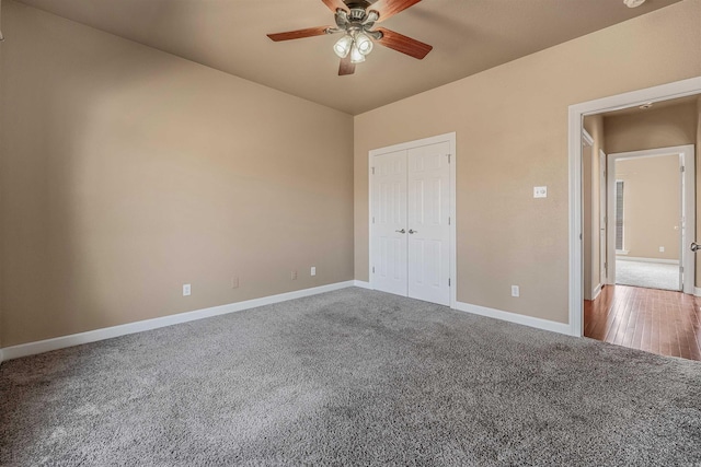 unfurnished bedroom featuring baseboards, carpet floors, and ceiling fan