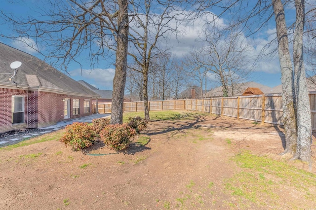 view of yard featuring a fenced backyard