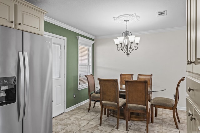 dining space featuring a chandelier, visible vents, baseboards, and ornamental molding